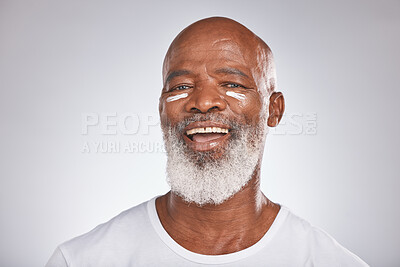 Buy stock photo Black man, skincare and facial cream on healthy skin in studio for self care with dermatology and cosmetics product. Face portrait of happy senior male with lotion for glow, health and wellness