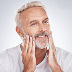 Healthy skincare, mature man and touching face on studio background. Mature guy, clean beard or facial cosmetics of male beauty, happy aesthetics and natural body care, cream and wellness dermatology