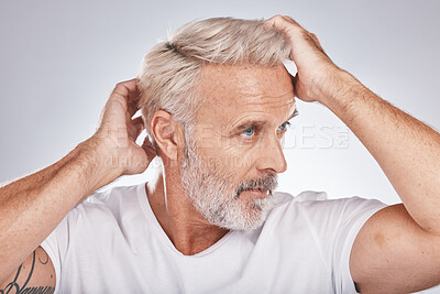 Buy stock photo Senior man, hair care and barbershop or salon studio background for beauty, cosmetic and shampoo. Face of old person grooming to check and clean scalp for dandruff and growth with dermatology product
