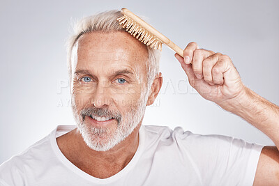 Buy stock photo Portrait man brush hair on studio background for beauty, barber salon and cosmetics. Happy face, male model and hairstyle comb for self care of smooth hair care, healthy shampoo and scalp product 