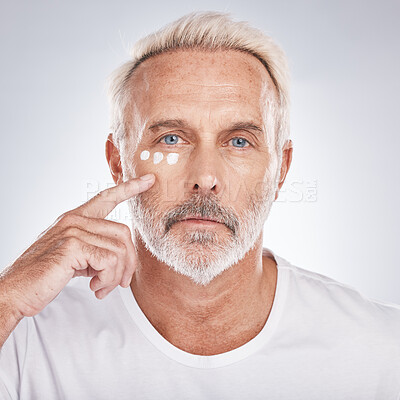 Buy stock photo Skincare, cream and portrait of senior man on white background for beauty, wellness and dermatology. Cosmetics, grooming and elderly male with anti aging beauty products, facial treatment and lotion