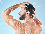 Water, cleaning hair and man in shower with shampoo, conditioner and hair products on blue background. Hygiene, grooming and male profile washing body in bathroom for spa, wellness and hair care