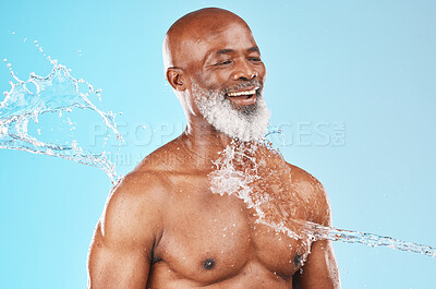 Buy stock photo Beauty, health and senior black model with water satisfied with self care, skincare and cleaning routine. Mature cosmetic man washing body with smile for grooming hygiene on blue studio background.

