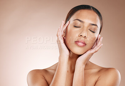 Buy stock photo Skincare, beauty and relax, woman with eyes closed and facial massage on studio background. Makeup, glamour and luxury skin care with hands massaging face, mockup for acupressure detox on black woman