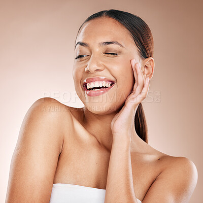 Buy stock photo Skincare, beauty and happiness, woman with smile laughing on studio background at fun spa. Makeup, glamour and wink, luxury skin care with hands on face, natural detox facial massage on happy woman.