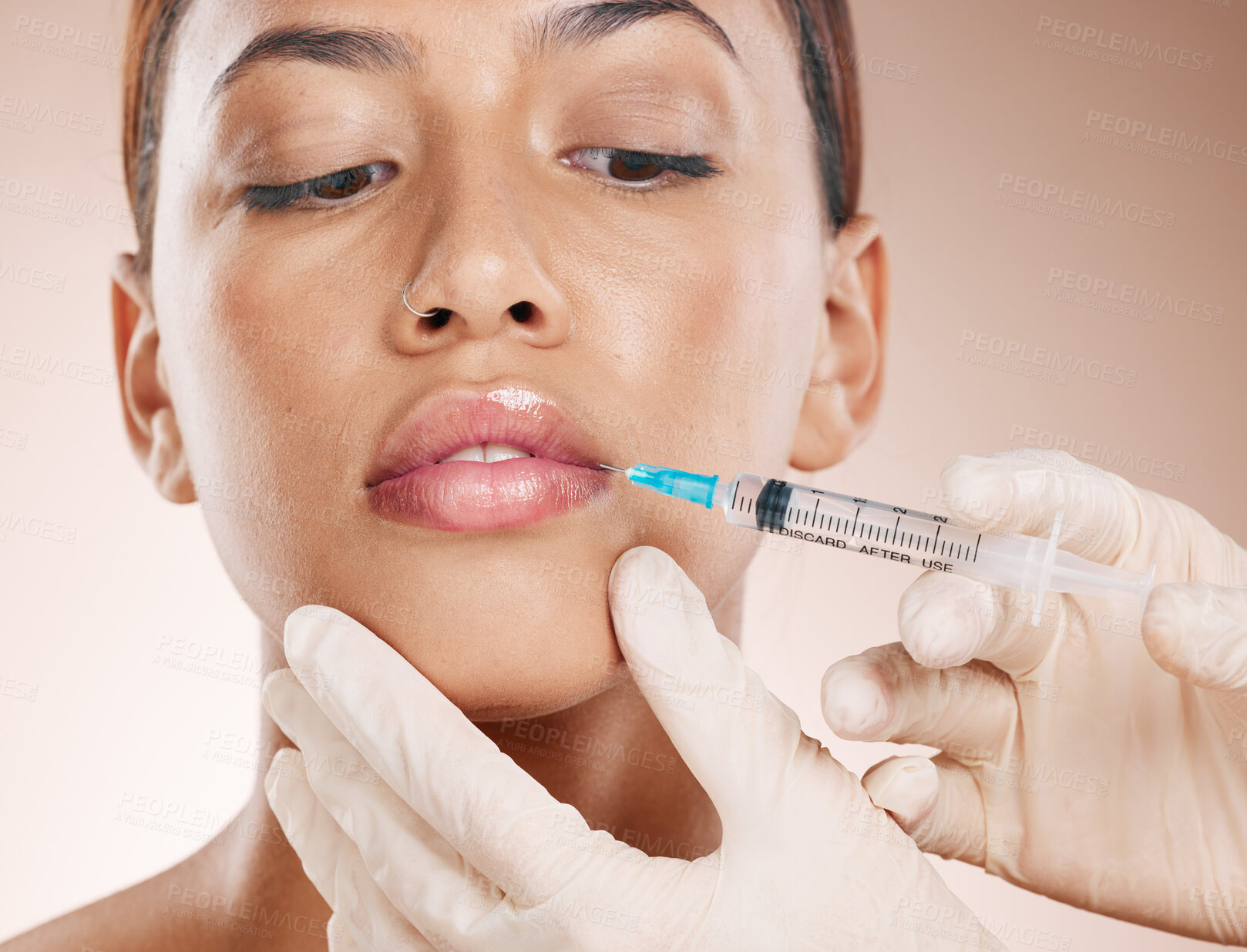 Buy stock photo Botox, face and beauty with woman and lip filler, plastic surgery zoom and syringe needle for procedure. Hands, serum and cosmetic care for lips, facial injection treatment against studio background