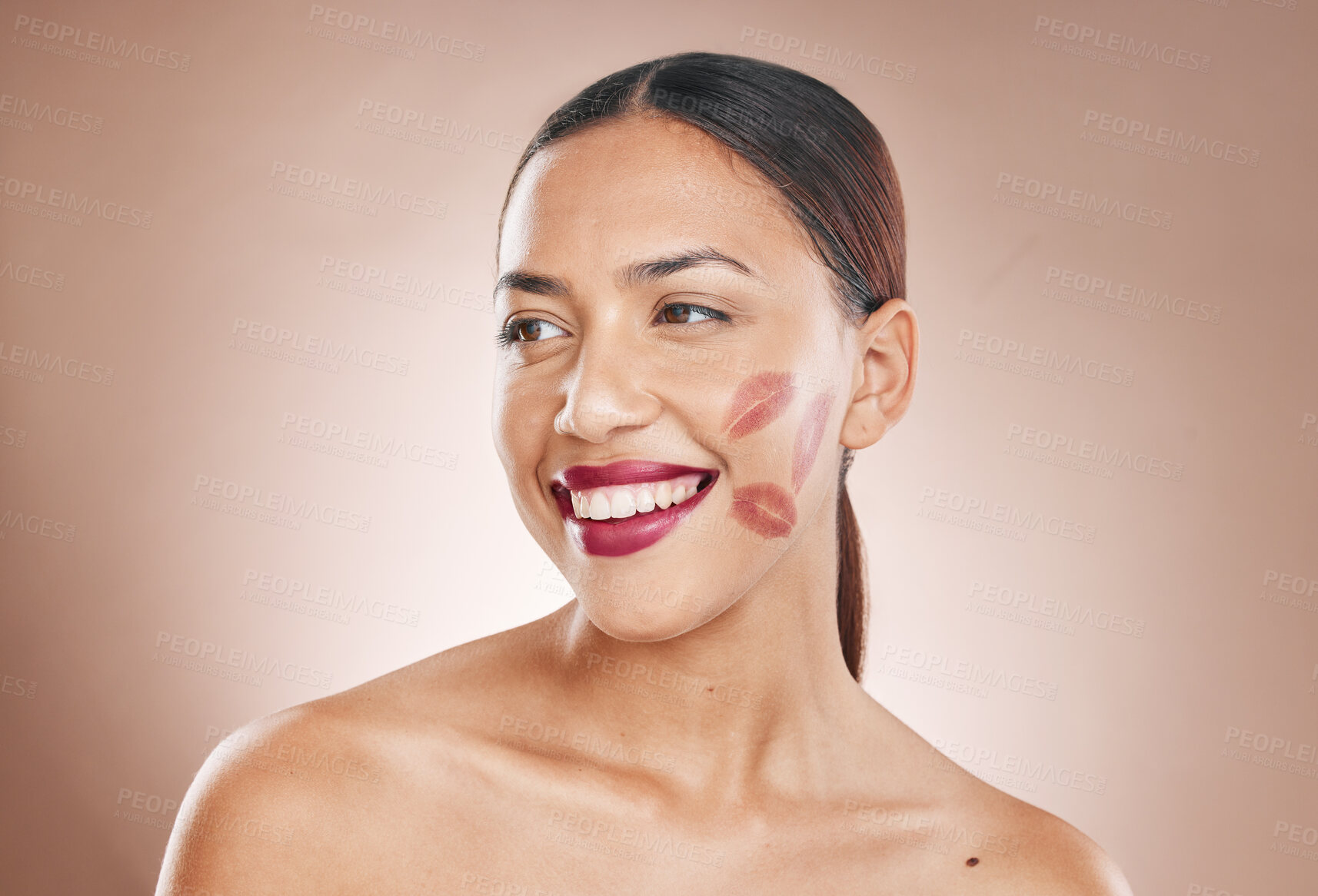 Buy stock photo Beauty, makeup and woman with lipstick and cosmetics on a studio background for dermatology, fashion and salon mockup. Face and headshot of aesthetic female model with a smile, glow and healthy skin