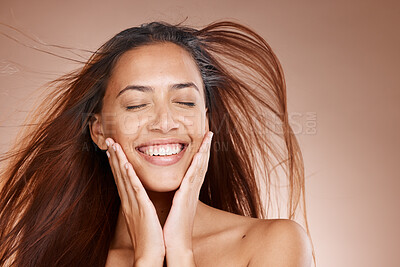 Buy stock photo Face, beauty skincare and woman with eyes closed in studio on a brown background mockup. Hands, makeup cosmetics and happy female model satisfied with spa facial treatment for healthy or glowing skin
