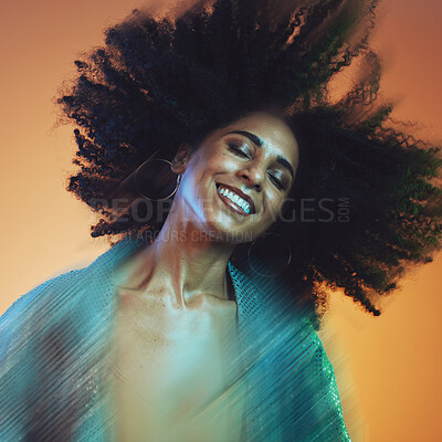 Buy stock photo Hair movement, beauty and face of black woman with afro in studio for hair care, beauty products and wellness. Creative art, hair salon and happy female with motion for cosmetics, fashion and makeup 