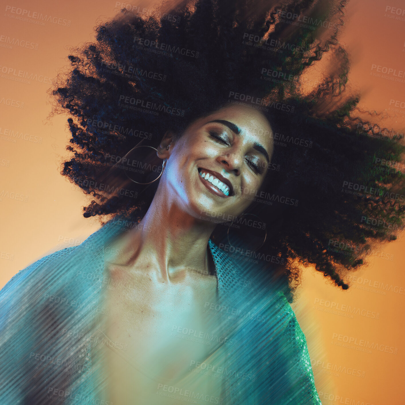 Buy stock photo Hair movement, beauty and face of black woman with afro in studio for hair care, beauty products and wellness. Creative art, hair salon and happy female with motion for cosmetics, fashion and makeup 