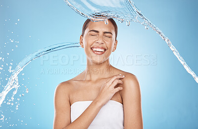 Buy stock photo Woman skincare, laughing or water splash on blue background studio for shower healthcare wellness, Brazil hygiene maintenance or self care grooming. Happy smile, beauty model and cleaning water drop