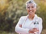 Senior woman, nature and water bottle while outdoor for exercise, fitness and a healthy lifestyle with a walk or run. Portrait of happy black female at park for cardio, health and wellness in summer