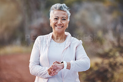 Buy stock photo Fitness, smartwatch and portrait of a senior woman in nature for running, cardio and workout for health and wellness. Elderly female in a forest with watch app for healthy lifestyle, body and energy