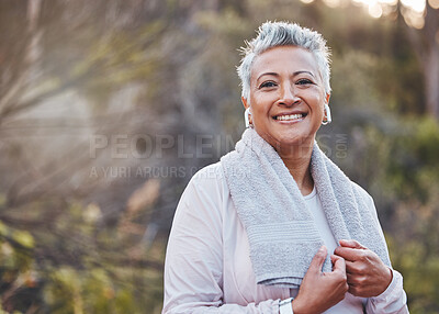 Buy stock photo Exercise, music and portrait of a senior woman outdoor with earphones and towel for fitness in nature. Elderly female in woods to run for healthy lifestyle, body and energy with cardio workout