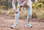 Sports, knee pain and woman in park after running, exercise and marathon training for healthy lifestyle. Wellness, fitness and hands of female athlete with muscle strain, leg injury and accident