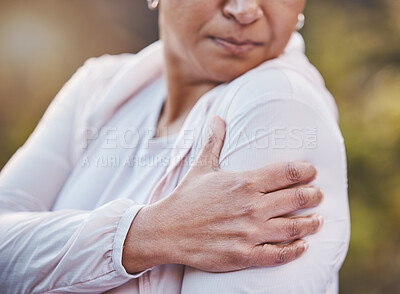 Buy stock photo Senior woman, sports injury and shoulder pain at park after accident. Wellness, health and hand of elderly female on arm  with muscle inflammation or fibromyalgia after exercise or training outdoors.