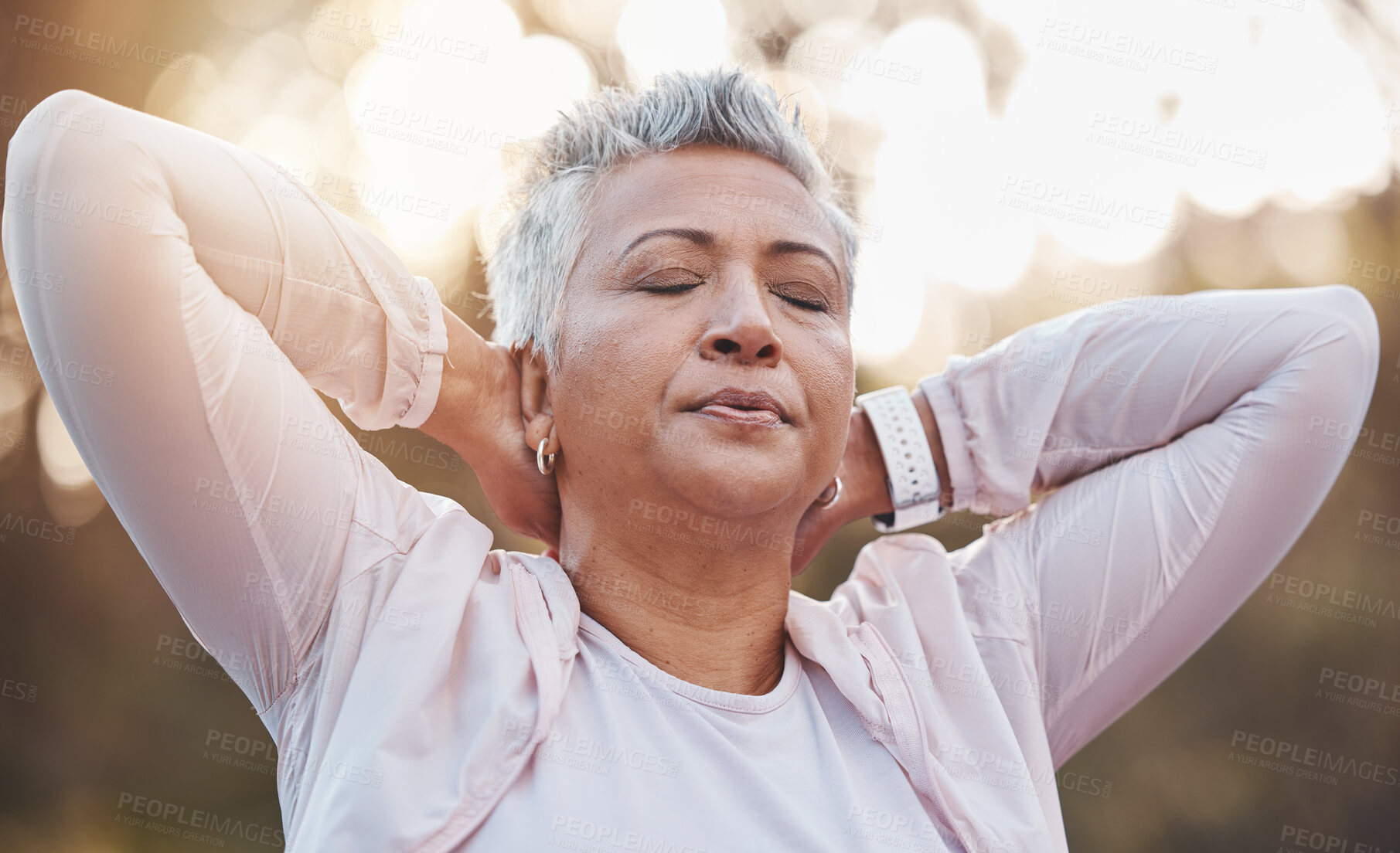 Buy stock photo Senior woman, breathing and stretching arms outdoor for fitness exercise, runner warm up and workout training. Nature forest, elderly athlete and closed eyes for performance, breathe and body stretch