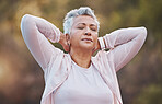 Senior woman, outdoor exercise and stretching arms for sports fitness or runner workout training in nature park. Mature athlete, cardio warm up and body stretch or performance breathing in forest 