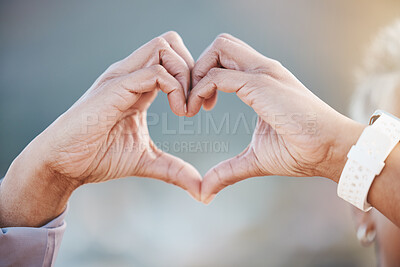 Buy stock photo Hands, heart sign and senior woman in nature for healthy workout, exercise or training outdoors. Sports, fitness and retired female with gesture for love emoji, affection or romance, support and care