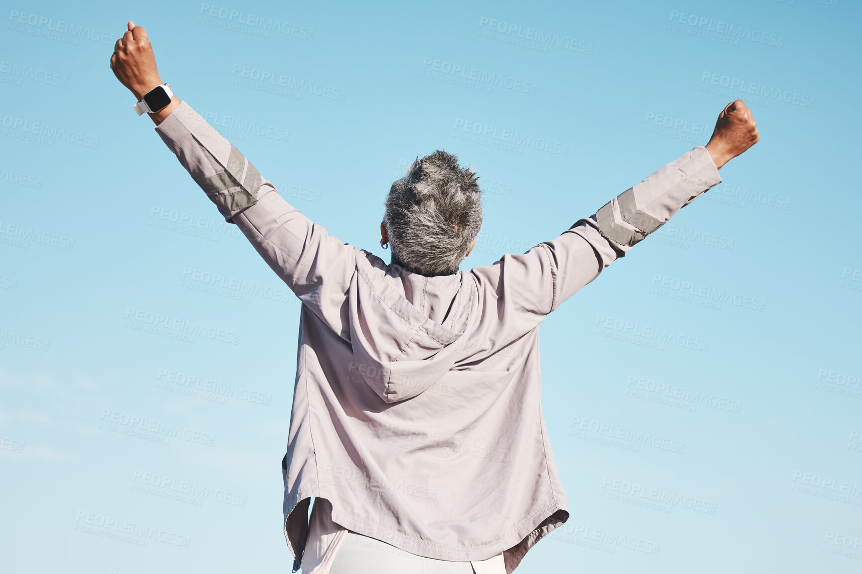 Buy stock photo Freedom, fitness and woman hands in air on blue sky mockup for exercise, fitness or workout training goals, success and achievement. Winner, wow and healthy senior or runner rear in nature wellness