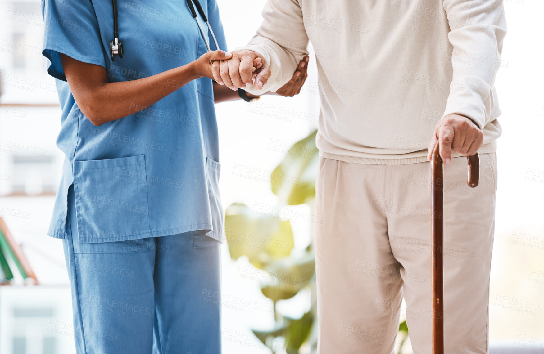 Buy stock photo Nurse, disability and old man with walking stick in nursing home for osteoporosis, rehabilitation and cancer. Cane, disabled patient and support for physiotherapy with caregiver, healthcare and hands