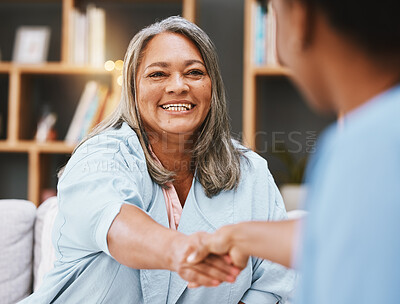 Buy stock photo Handshake, healthcare and appointment with a senior woman shaking hands with a female nurse in a retirement home. Thank you, medical and meeting with a mature patient and medicine professional