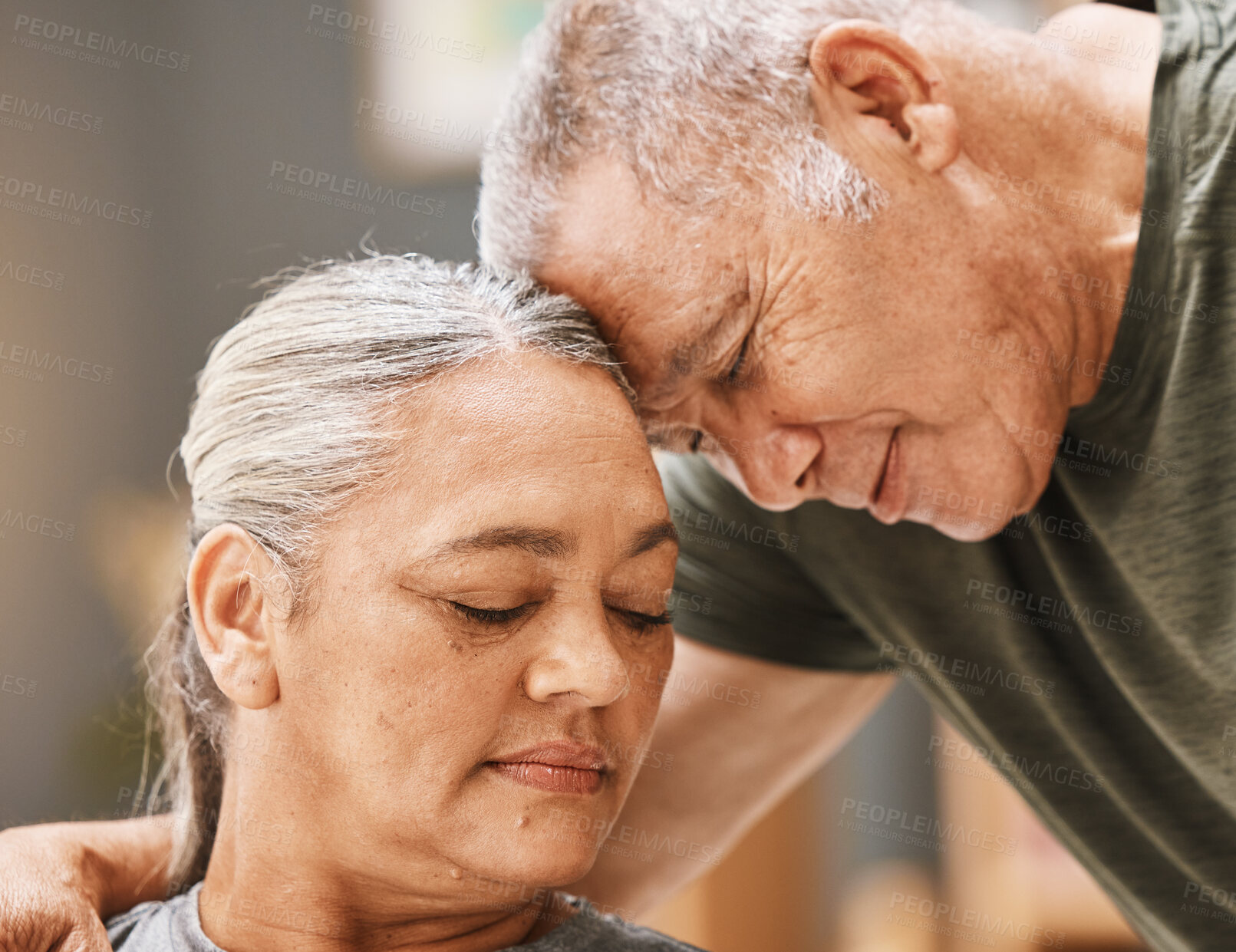 Buy stock photo Love, support and senior couple hugging, bonding and spending quality time together at their home. Affection, romance and elderly man and woman in retirement embracing with care at their house.