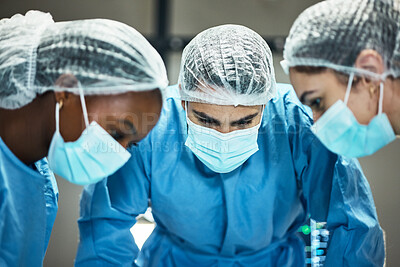 Buy stock photo Healthcare, teamwork and surgery, doctors in operating room in medical emergency at hospital. Doctor, nurses and diversity, surgical team in operation theater together with ppe, face mask and scrubs.
