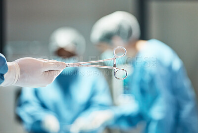 Buy stock photo Hospital scissors, surgery and team of doctors in theatre for medical trust, innovation or support with healthcare insurance background. Hand holding tools, surgeon or nurse helping in operating room