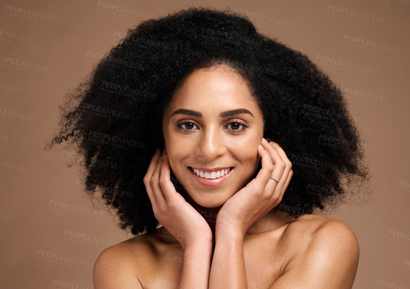 Buy stock photo Black woman, studio portrait and skincare for beauty, makeup and cosmetic health with hands, face or natural hair. Model, smile and facial skin cosmetics, self care or afro by brown studio background