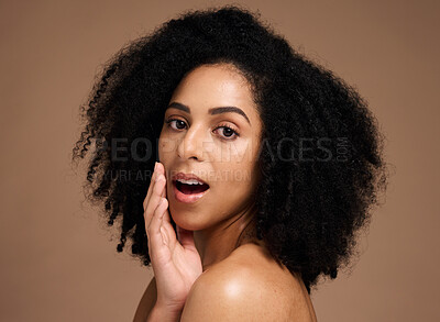 Buy stock photo Face, beauty and black woman with skincare secret in studio on a brown background. Makeup cosmetics, portrait and young female model with glowing, healthy and flawless skin after spa facial treatment