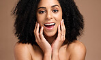 Face portrait, surprise and skincare of black woman in studio isolated on a brown background. Makeup cosmetics, wow and female model shocked at transformation after spa facial treatment for beauty.