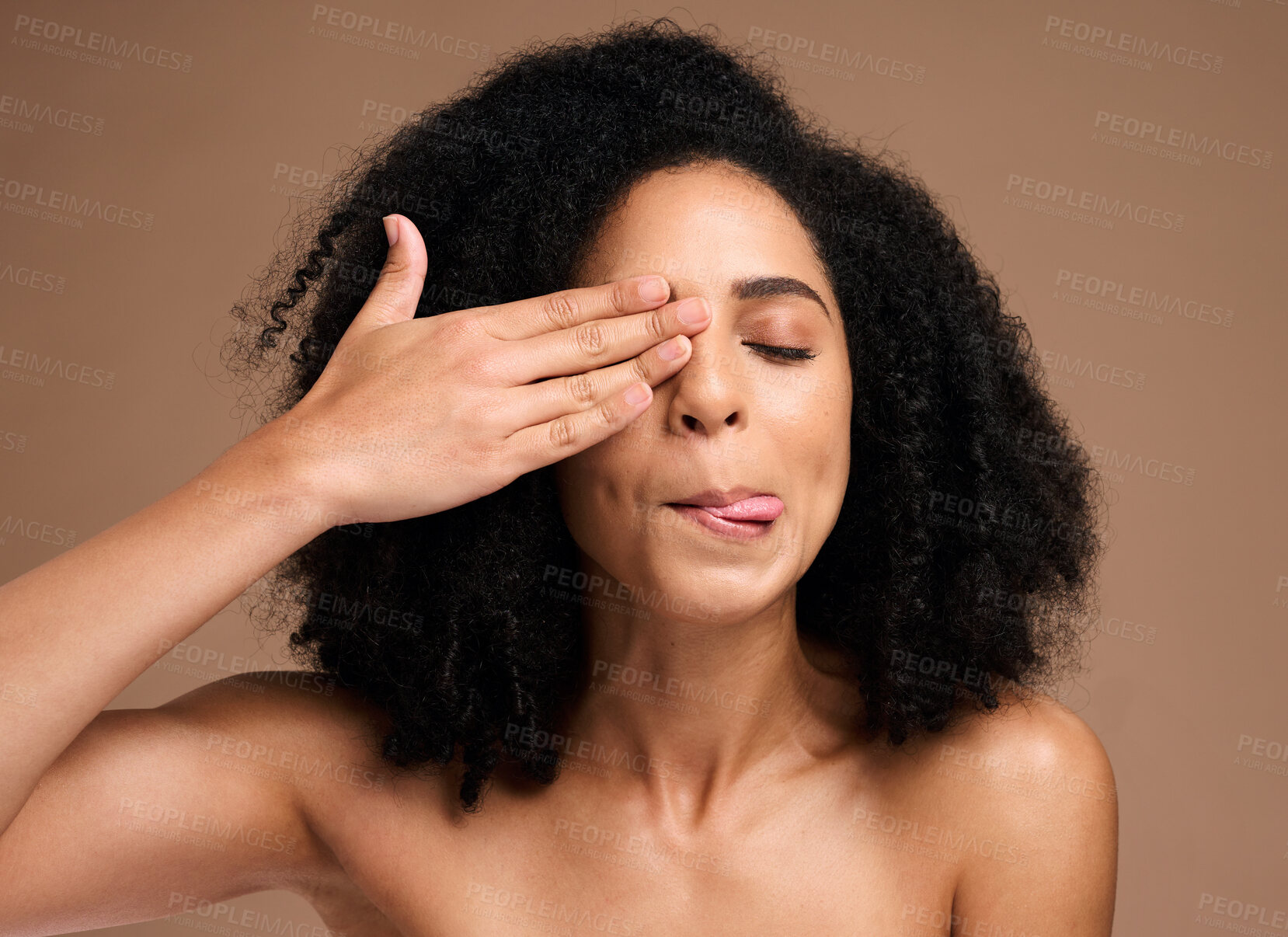 Buy stock photo Funny face, beauty and black woman with skincare, skin glow and natural cosmetics, hair and playful against studio background. Clean facial, fun with hand and manicure, cosmetic hair care wellness