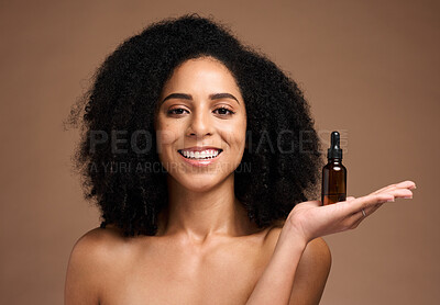 Buy stock photo Face portrait, skincare and black woman with bottle in studio isolated on a brown background. Makeup, cosmetics and female model holding hyaluronic acid, product or essential oil for facial treatment