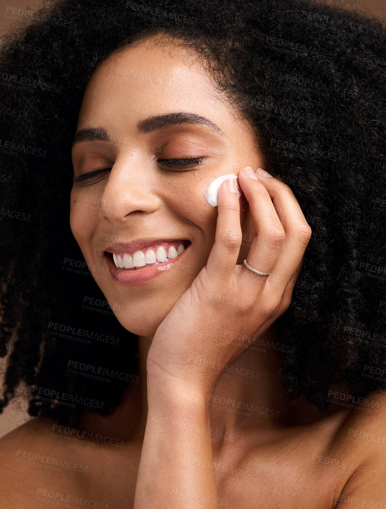 Buy stock photo Black woman, skincare and cream for face, makeup and sunscreen product for wellness, luxury beauty and salon cosmetics. Happy model, facial lotion and natural dermatology, aesthetic and healthy glow
