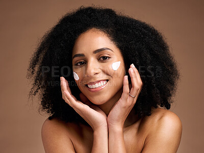 Buy stock photo Beauty, sunscreen and face of African woman in studio for facial, skincare and cosmetics promotion of wellness product. Black woman model with skin care, dermatology or cream application in portrait