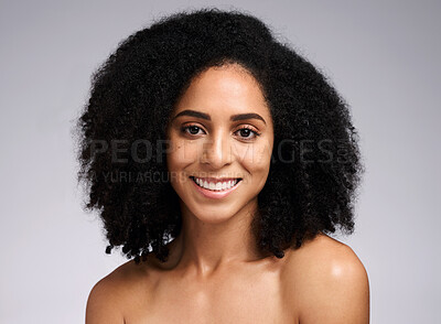 Buy stock photo Beauty, portrait and skincare with a model black woman in studio on a gray background for natural skin cosmetics. Face, hair and afro with an attractive young female posing to promote skin treatment