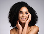 Black woman, beauty and face skincare with a smile, glow and happiness for clean skin on grey studio background. Aesthetic model with afro hair and dermatology, cosmetic and makeup for facial results