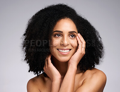 Buy stock photo Black woman, beauty and face skincare with a smile, glow and happiness for clean skin on grey studio background. Aesthetic model with afro hair and dermatology, cosmetic and makeup for facial results