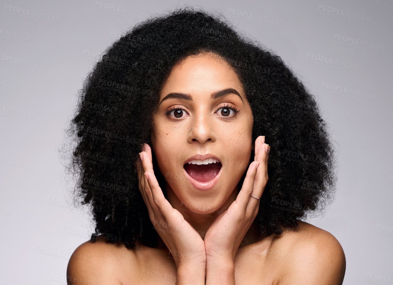 Buy stock photo Face skincare, wow and surprised black woman in studio isolated on gray background. Makeup cosmetics, portrait and female model shocked after spa facial treatment for healthy skin, beauty or wellness