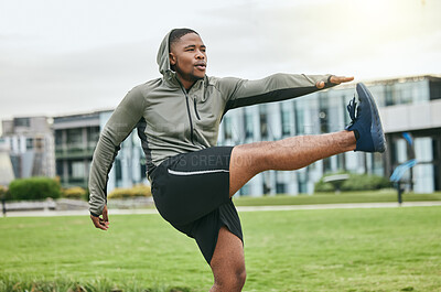Buy stock photo Fitness, running and stretching with a sports black man getting ready for exercise in a park during summer. Health, workout and start with a male athlete training on grass for cardio or endurance