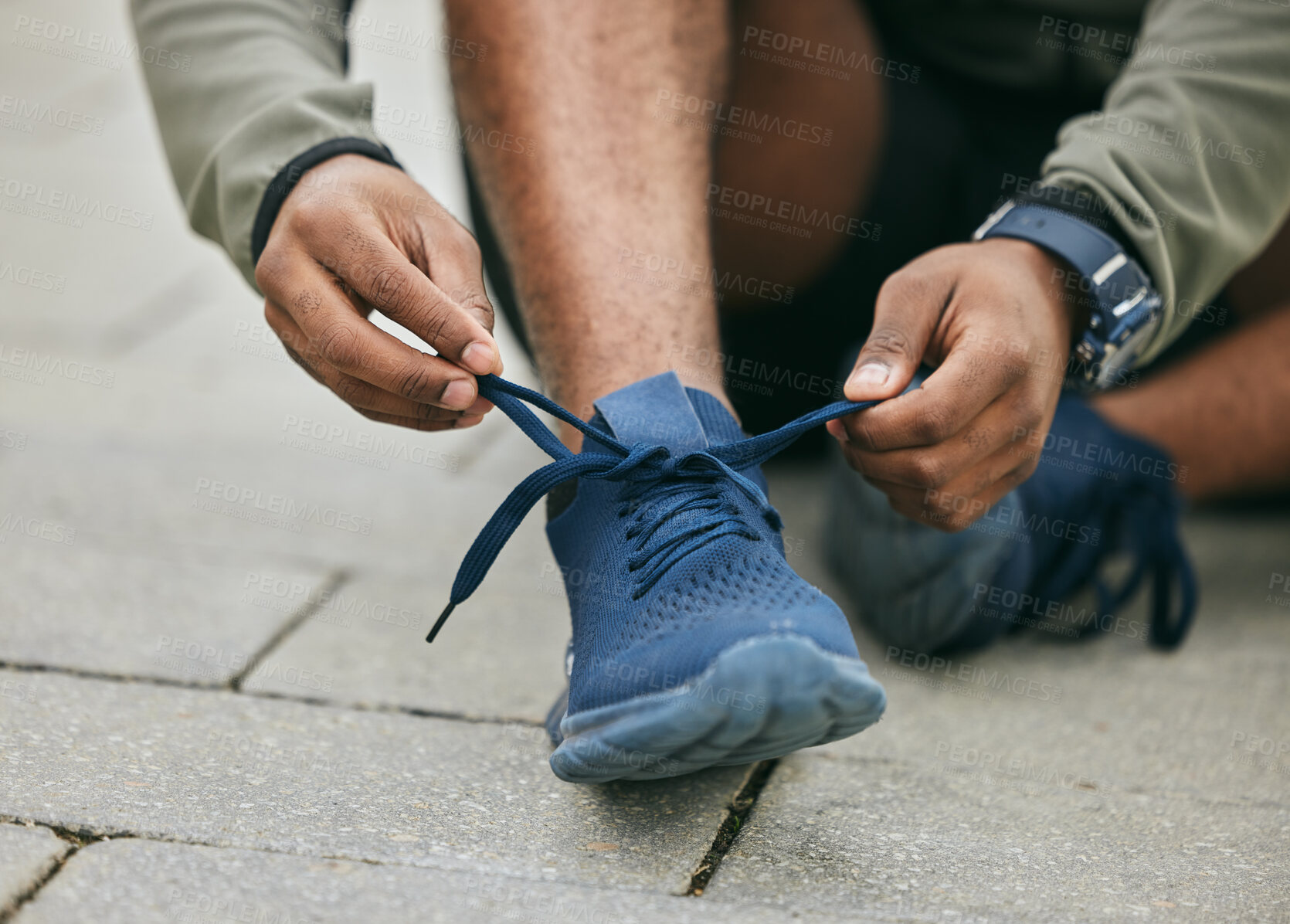 Buy stock photo Fitness, hands and black man tie shoes in city and getting ready for running, workout or exercise. Wellness, sports and male runner tying sneaker lace and preparing for training on street outdoors.
