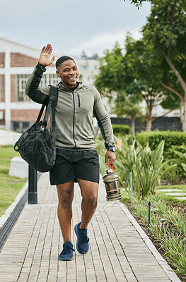 Buy stock photo Fitness, happy or black man walking to gym and wave for training, exercise or workout with a duffle bag in Miami, Florida. Smile, traveling or healthy sports athlete with goals, motivation or pride