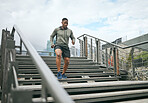 Fitness, bridge or black man running on stairs for legs training, exercise or workout in city of in Miami, Florida. Steps, runner or healthy sports athlete with wellness goals, motivation or mission