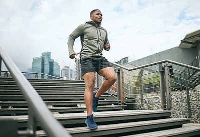 Buy stock photo Exercise, stairs and black man training, city or workout for fitness, fresh air or wellness. Nigerian male, trainer or athlete on steps, prepare for competition or running for energy, power or cardio