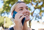 Phone call, park and communication with a woman talking on her mobile during a summer day outdoor. Smartphone, networking and nature with an attractive young female in a garden over the weekend