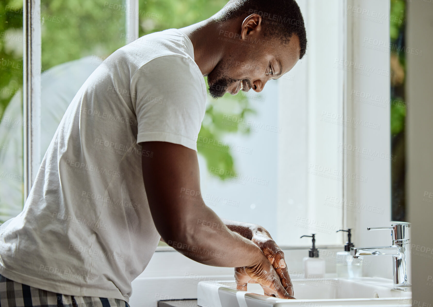 Buy stock photo Black man, washing hands or bathroom sink soap in home healthcare wellness, hygiene maintenance or house self care. Smile, happy or handwash cleaning with tap for skincare grooming or bacteria safety