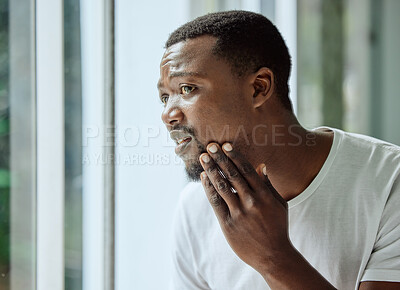 Buy stock photo Skincare, black man and acne stress at mirror in home bathroom with worried and confused face. Unhappy man checking pimple and blackhead problem in reflection with morning grooming routine.

