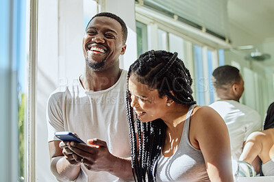 Buy stock photo Phone, laughing and black couple in home on social media  reading funny meme or joke. Relax comedy, cellphone and happy man and woman with mobile smartphone streaming or watching comic video online.