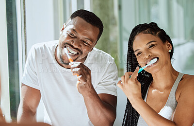 Buy stock photo Black couple, brushing teeth and dental cleaning in bathroom together for grooming hygiene, beauty wellness and healthcare with toothbrush. African man, woman and happy oral care morning routine